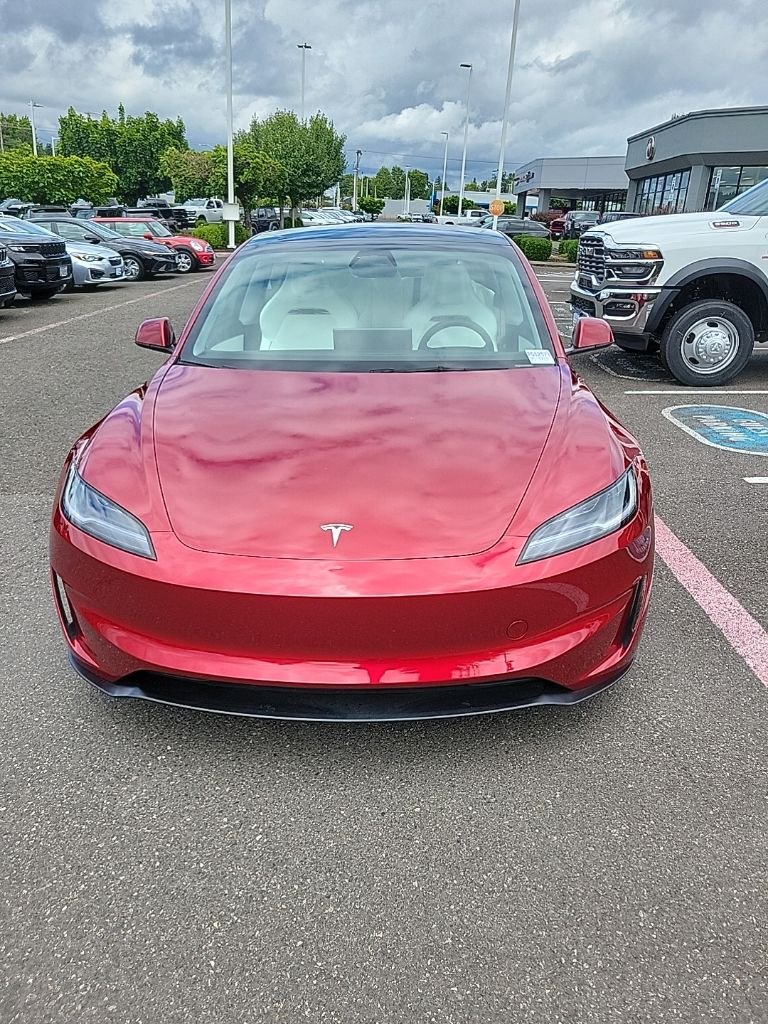 Used 2025 Red Tesla Performance image 2