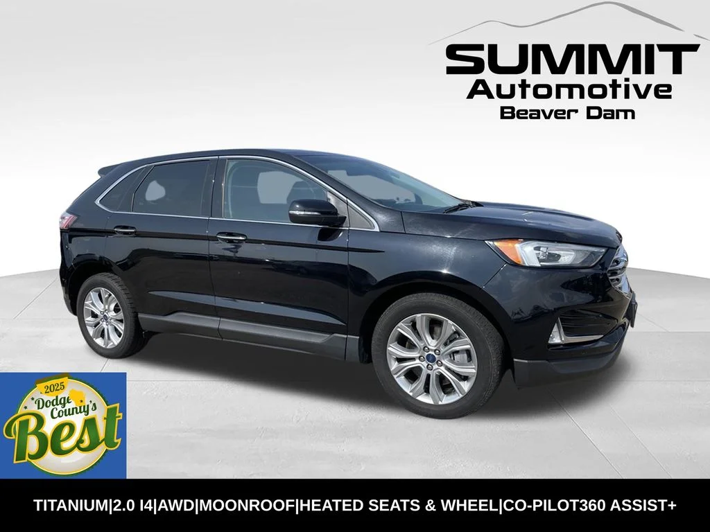 Used 2021 Black Metallic Ford Titanium image 1