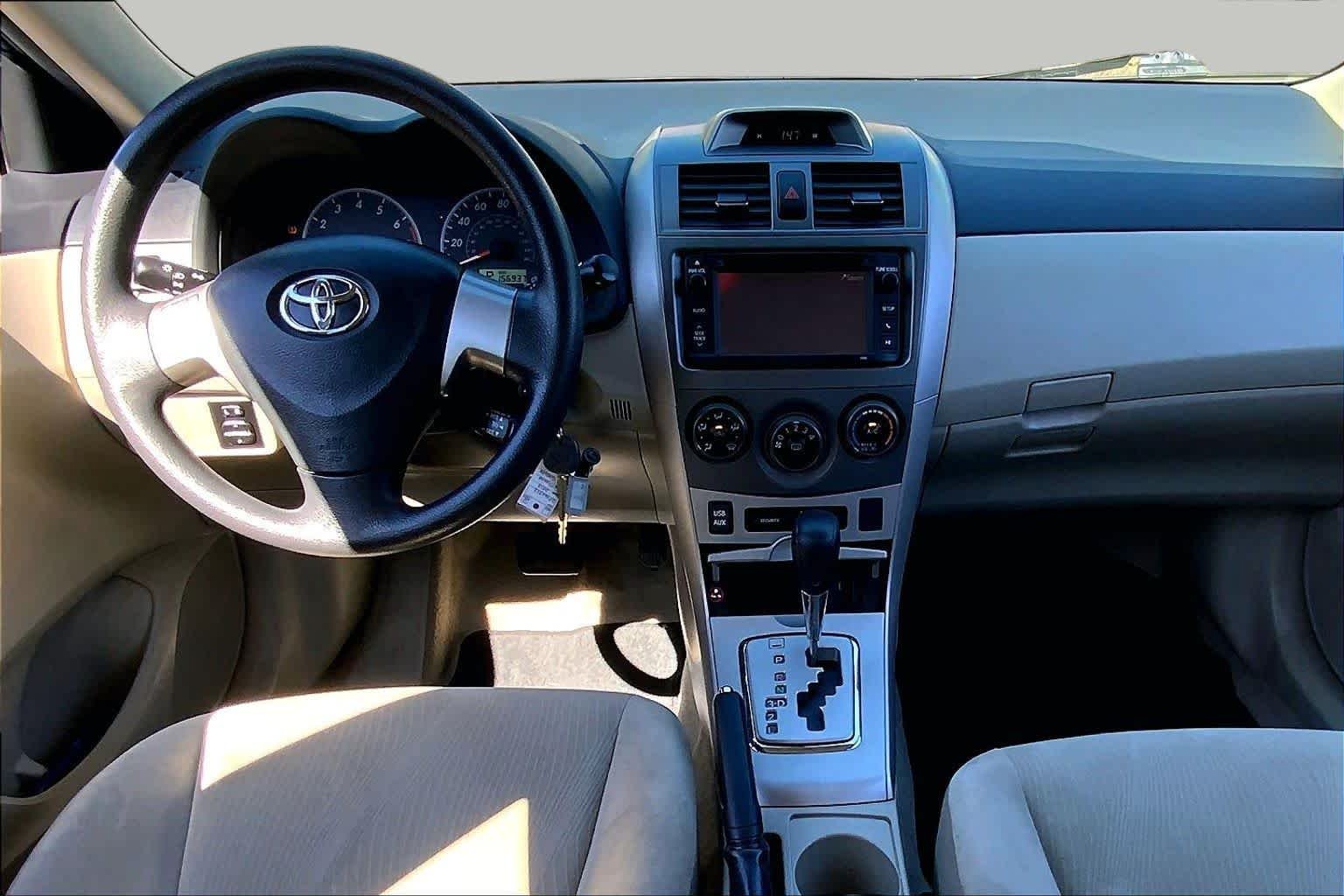 Used 2013 Tropical Sea Metallic Toyota LE image 16