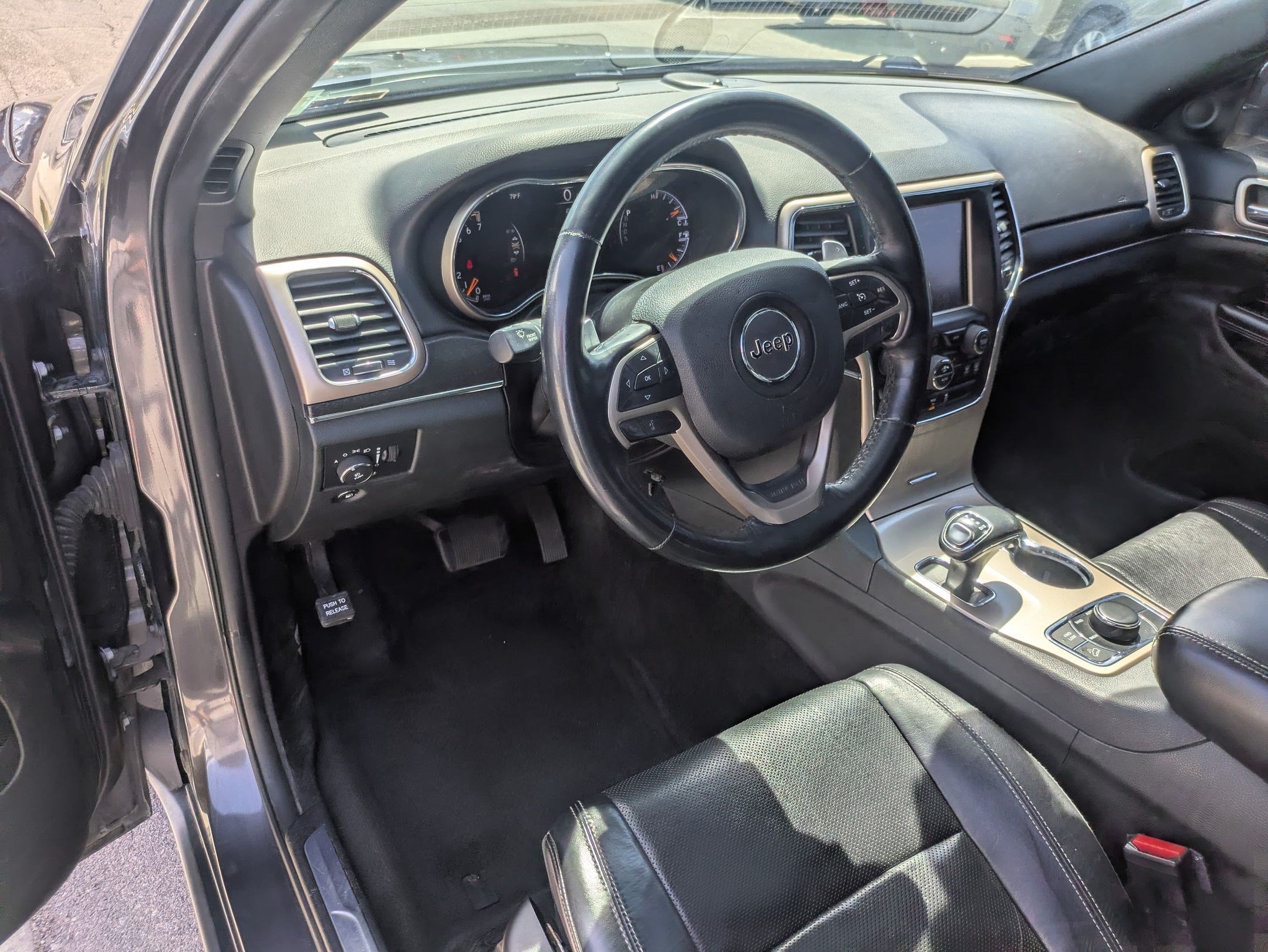 Used 2015 Granite Crystal Metallic Clearcoat Jeep Limited image 13