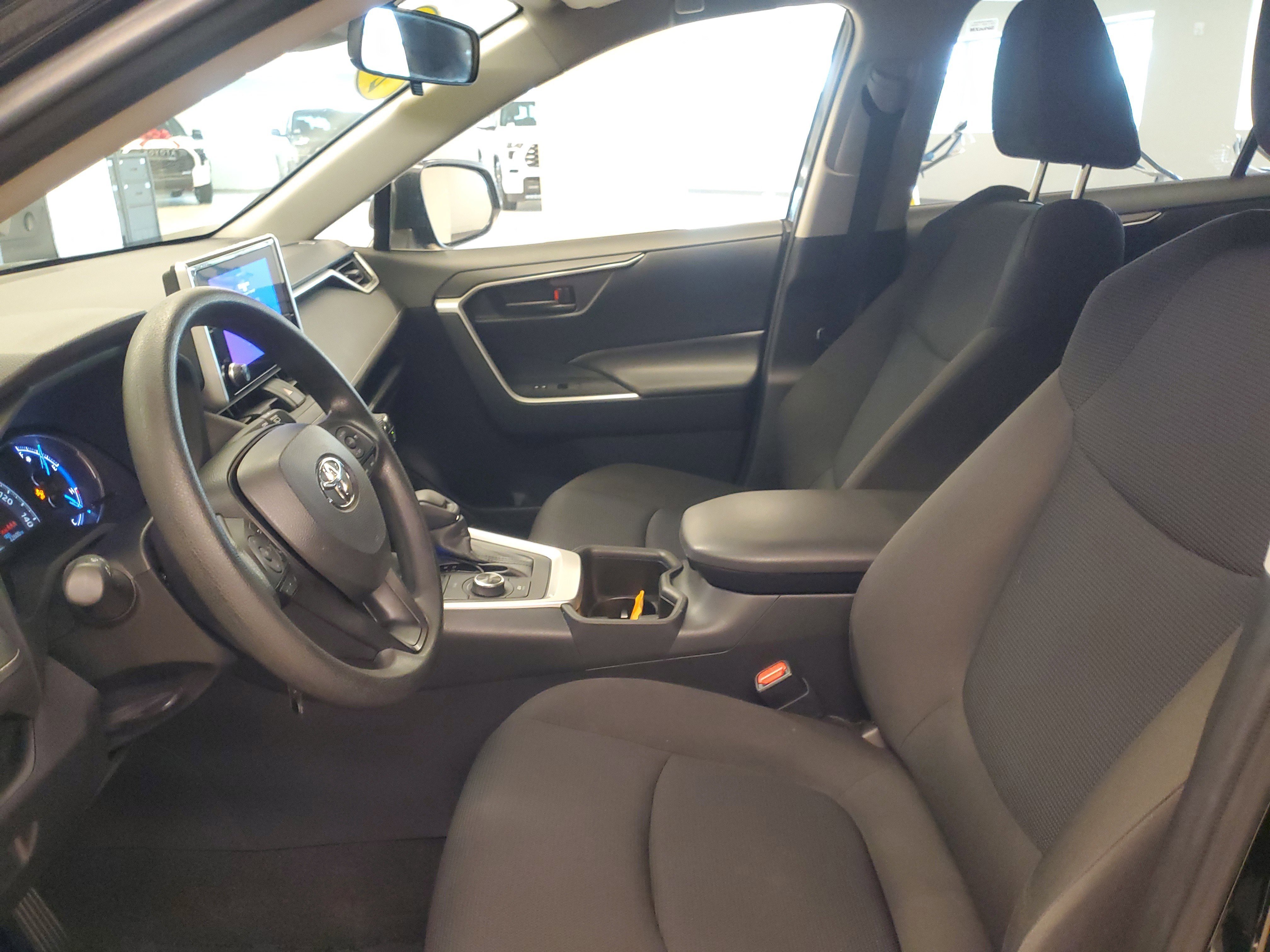 Used 2024 Midnight Black Metallic Toyota Hybrid LE image 14