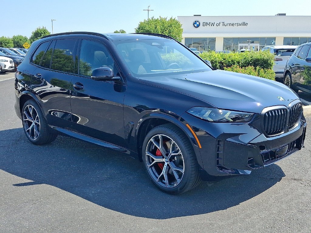 New 2026 Carbon Black Metallic BMW xDrive40i image 2