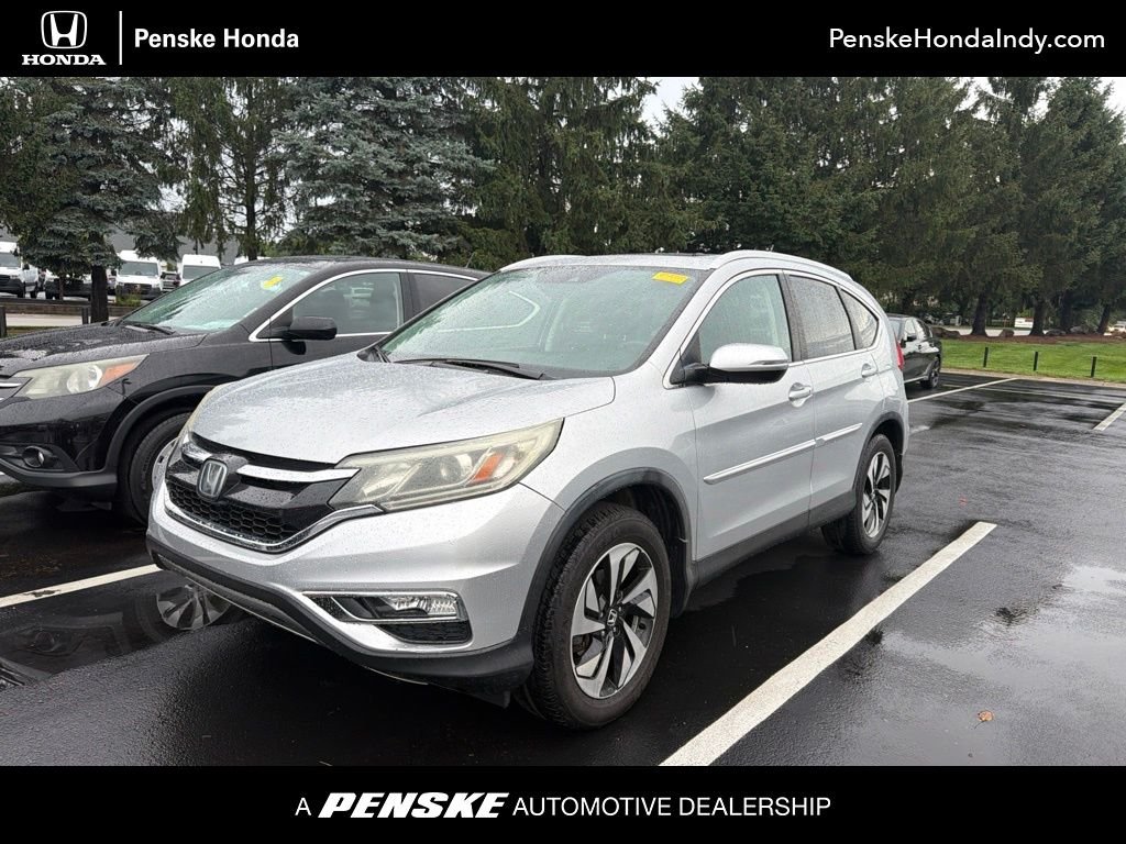 Used 2015 Alabaster Silver Metallic Honda Touring image 1