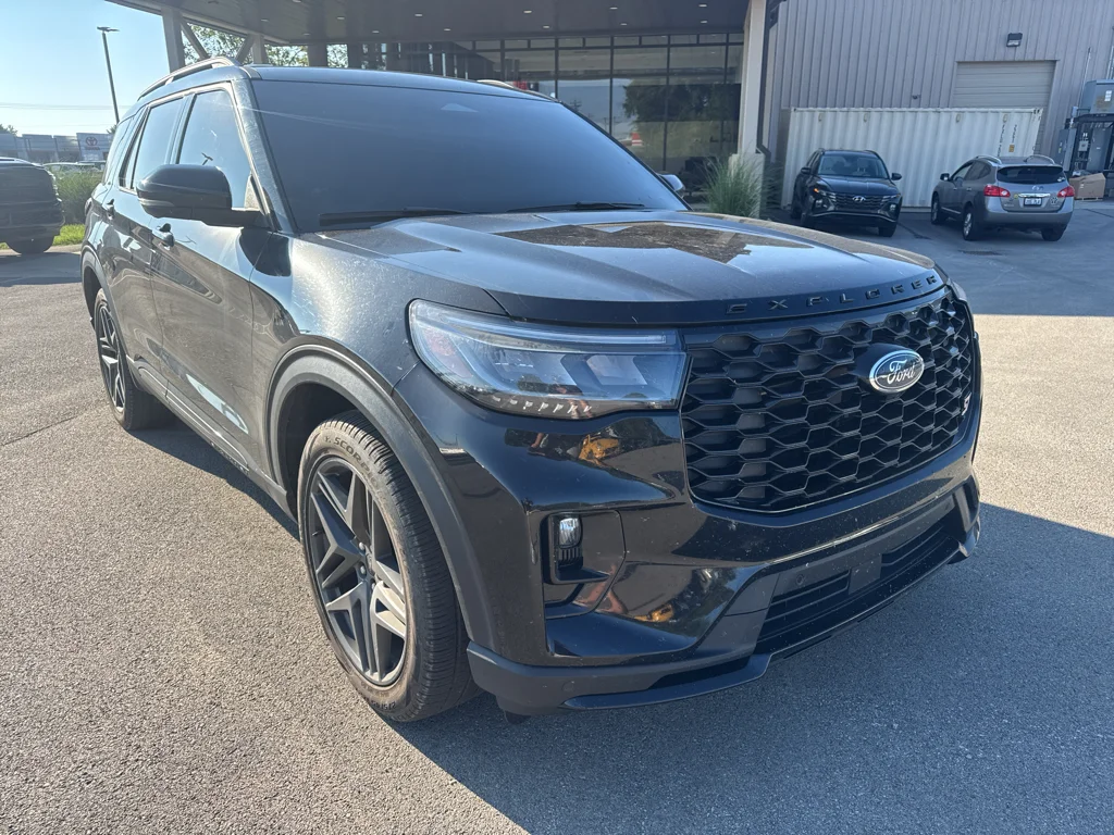 Used 2025 Agate Black Metallic Ford ST image 1
