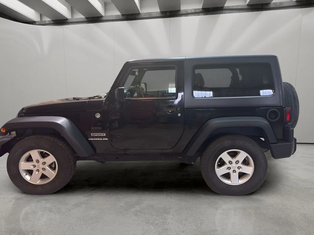 Used 2015 Jeep Wrangler Sport with VIN 1C4AJWAG1FL671362 for sale in Sterling, CO