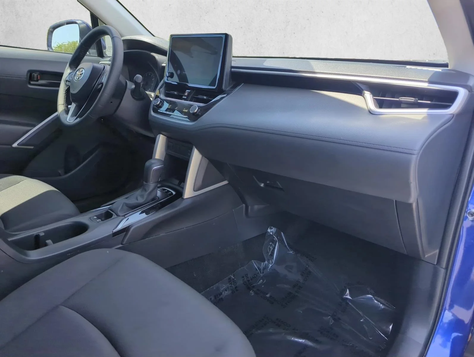 Used 2024 Blue Crush Metallic Toyota LE image 27