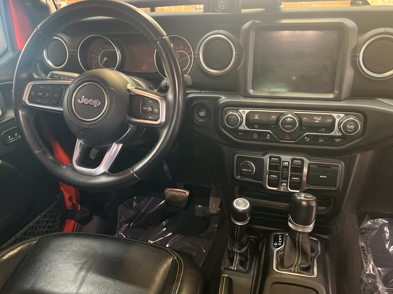 Used 2020 Orange Jeep Unlimited Sahara image 20