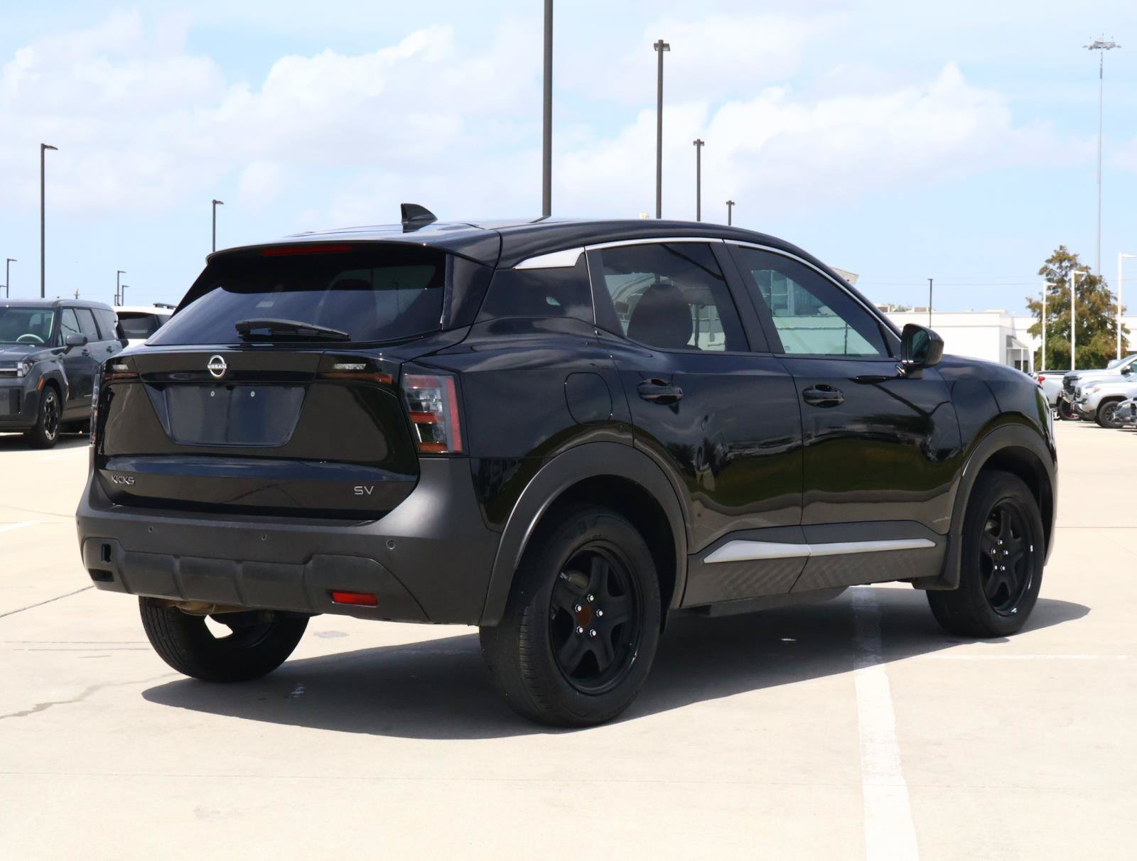 Used 2025 Super Black Nissan SV image 4