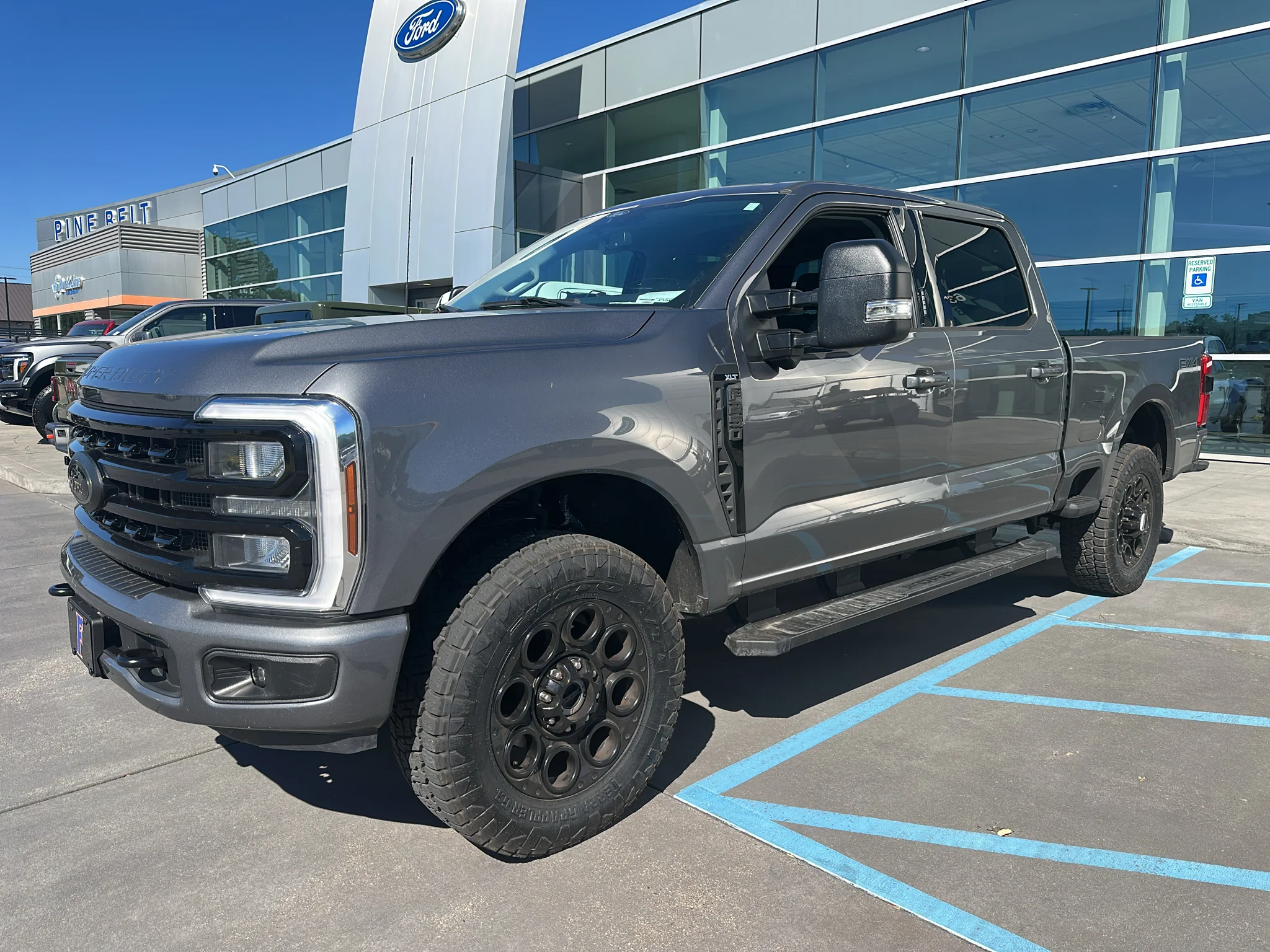 Used 2024 Carbonized Gray Metallic Ford XLT image 1