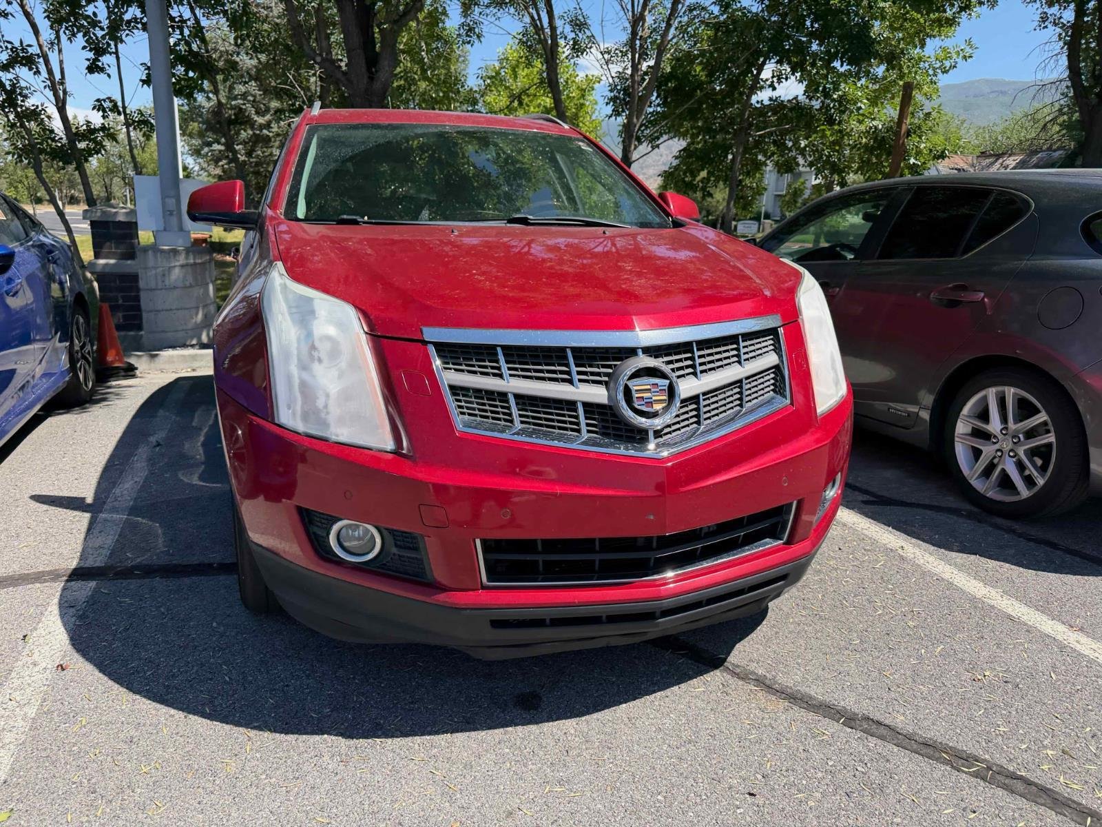 Used 2012 Crystal Red Tintcoat Cadillac Performance Collection image 4