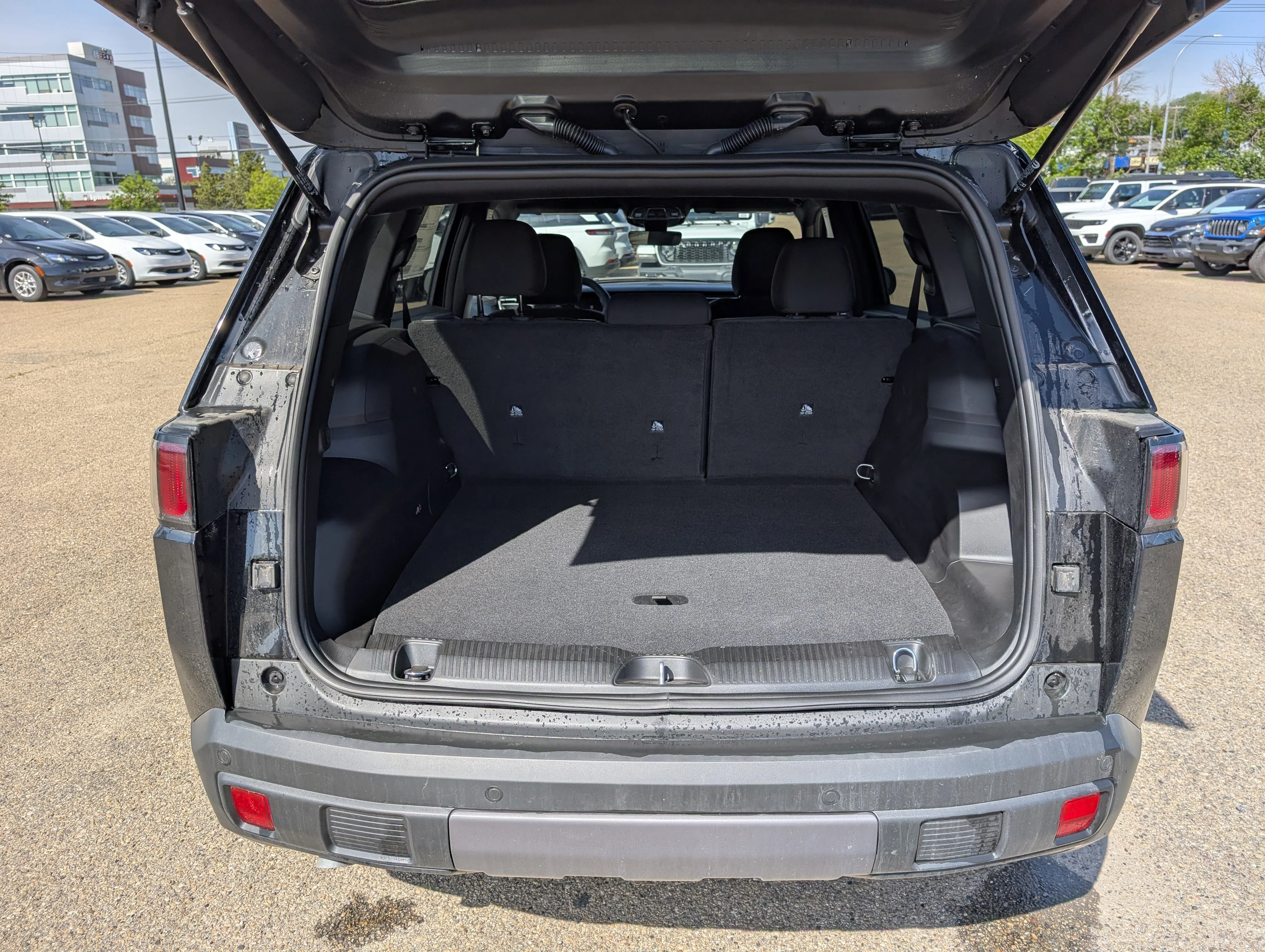 New 2026 Diamond Black Crystal Pearl Jeep Laredo image 6