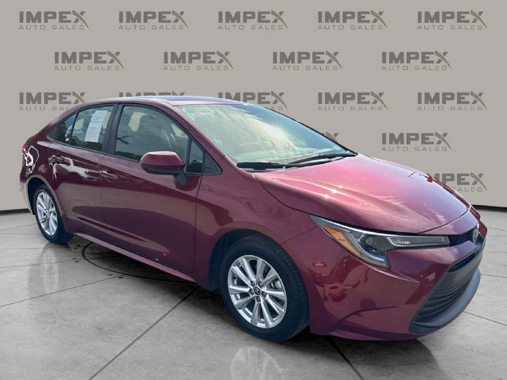 Used 2025 Red Toyota LE image 7