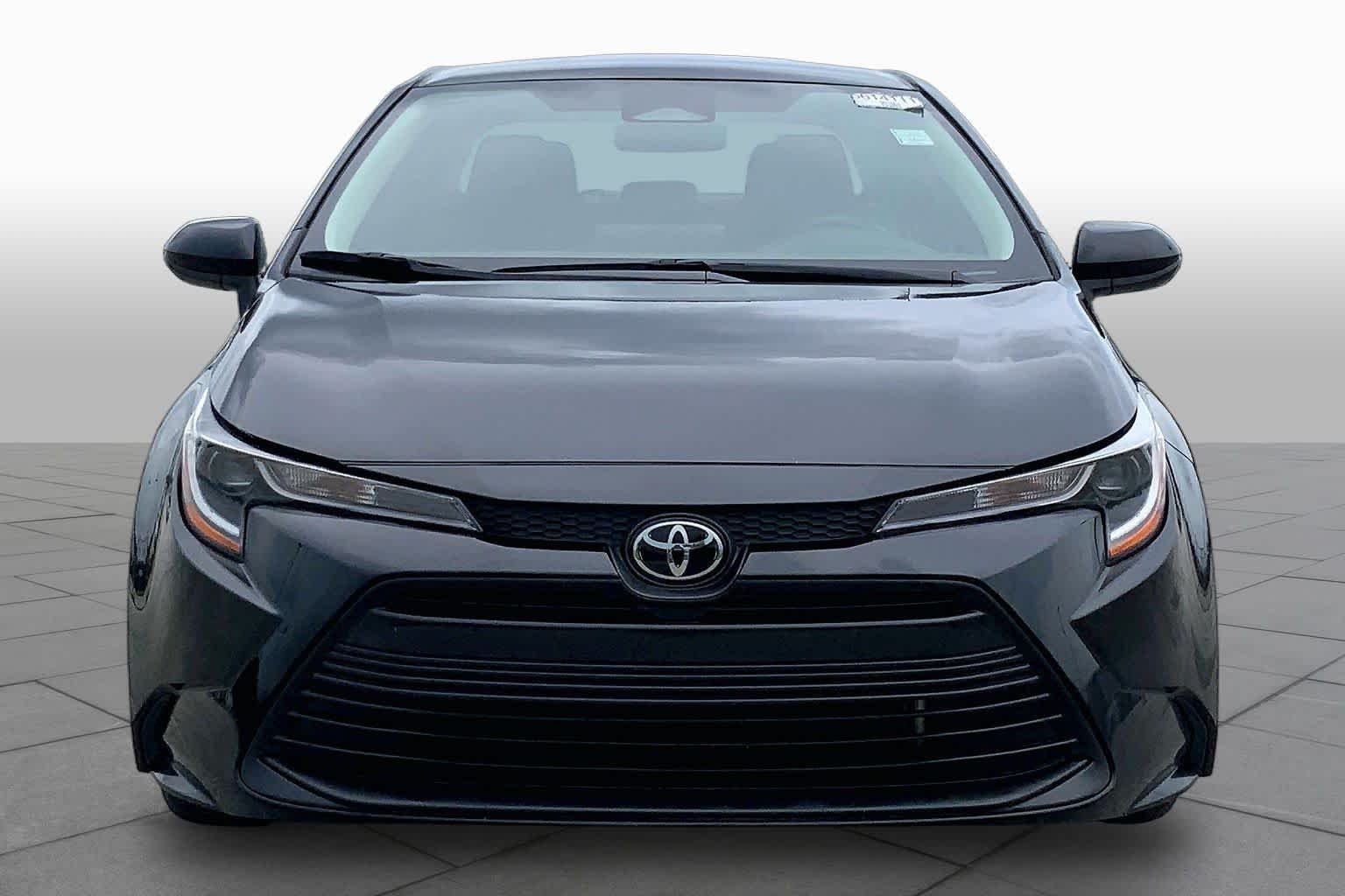 Used 2024 Midnight Black Metallic Toyota LE image 4