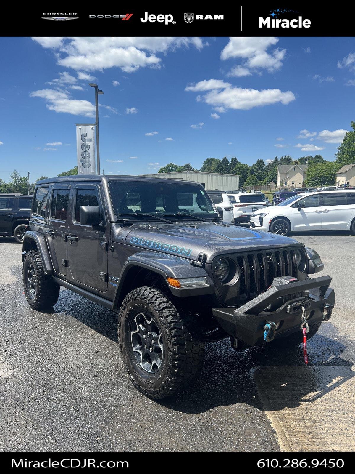 Used 2021 GRANITE CRYSTAL METALLIC CLEARCOAT JEEP UNLIMITED RUBICON image 1