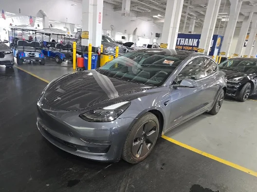 Used 2023 Midnight Silver Metallic Tesla Base image 1