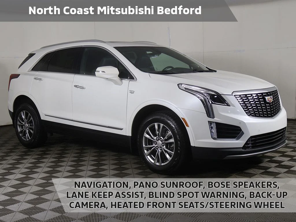 Used 2023 White Cadillac Premium Luxury image 1
