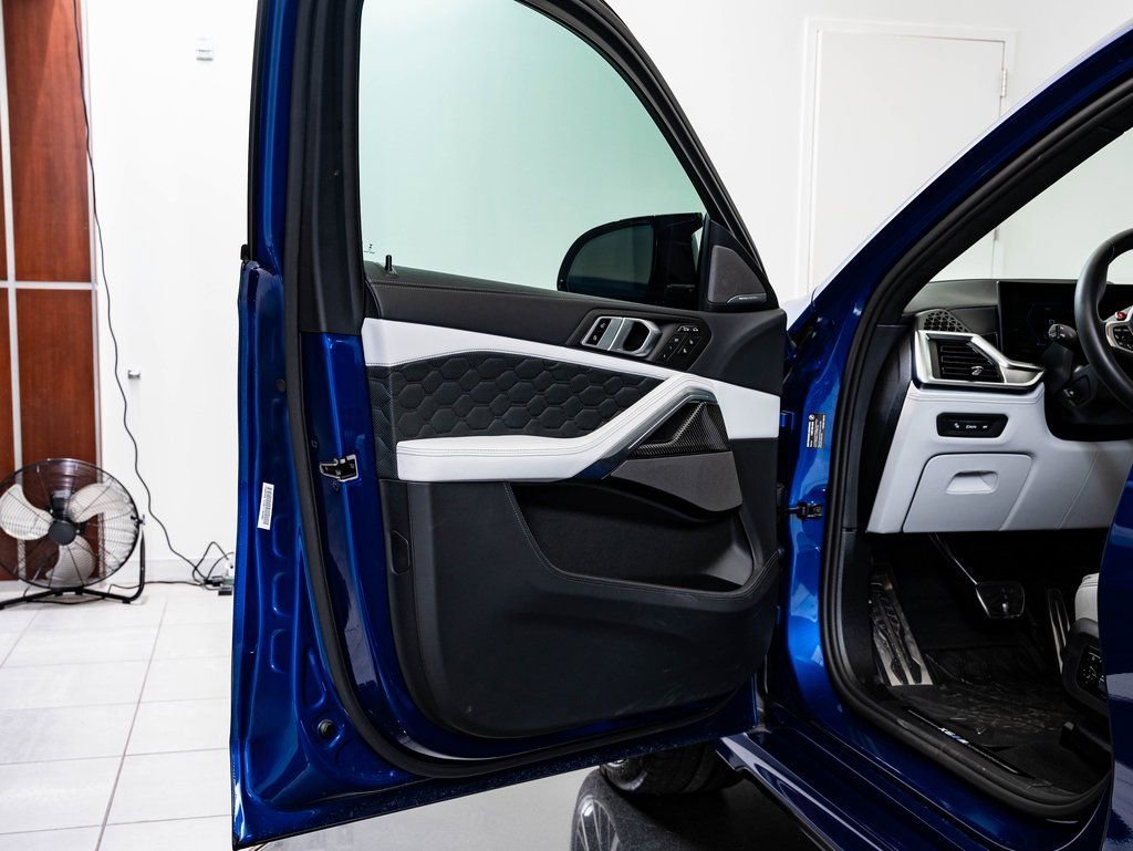 Used 2025 Marina Bay Blue Metallic BMW  image 27