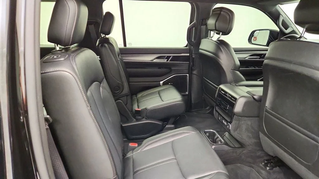 Used 2023 Diamond Black Crystal Pearlcoat Jeep Series II Carbide 4x4 w/ Tri-Pane Roof & Captain