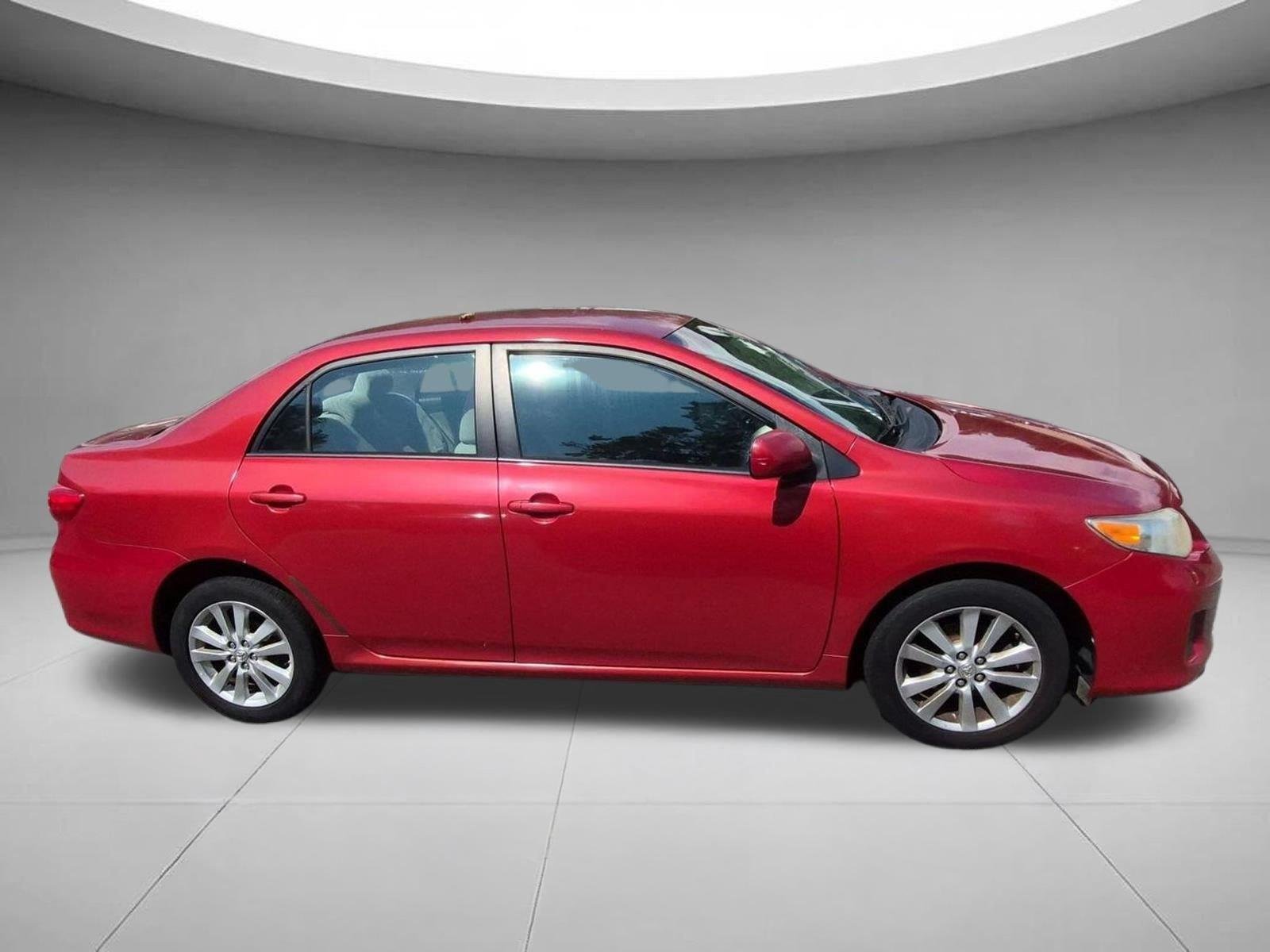 Used 2011 Barcelona Red Metallic Toyota LE image 6