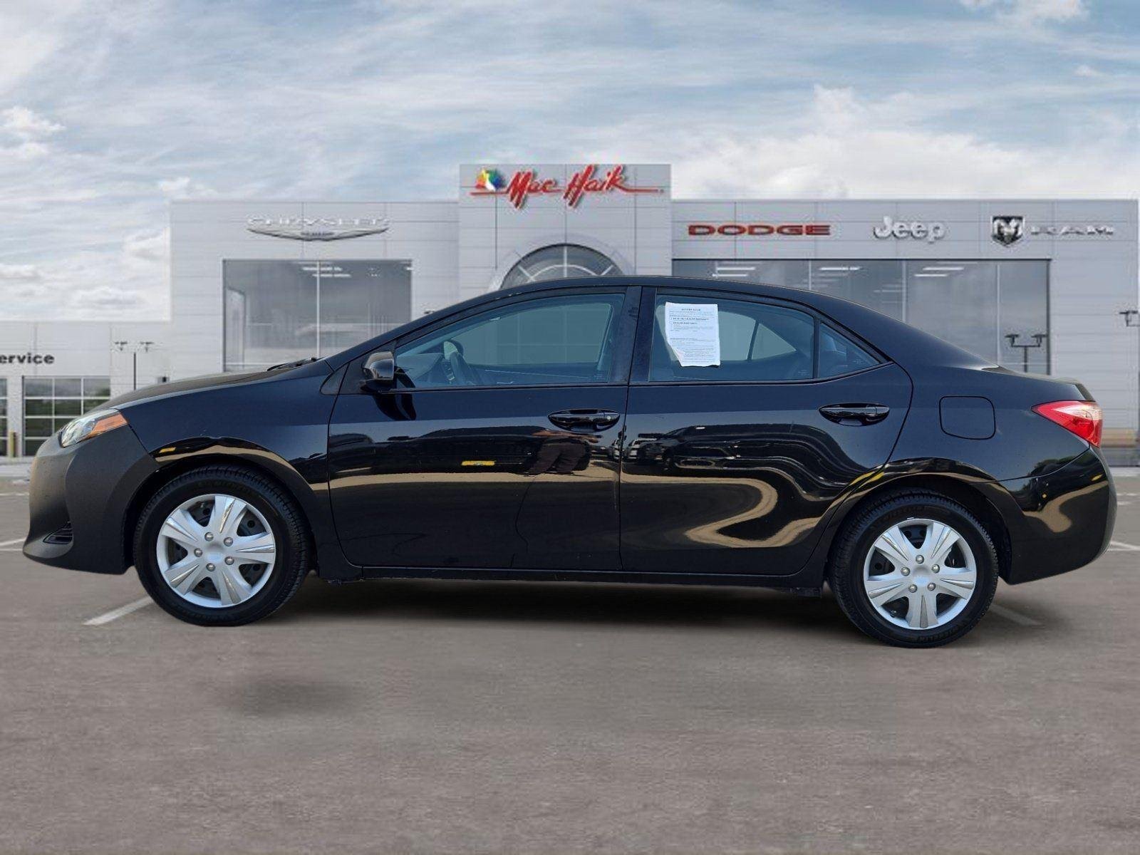 Used 2019 Black Sand Pearl Toyota LE image 2