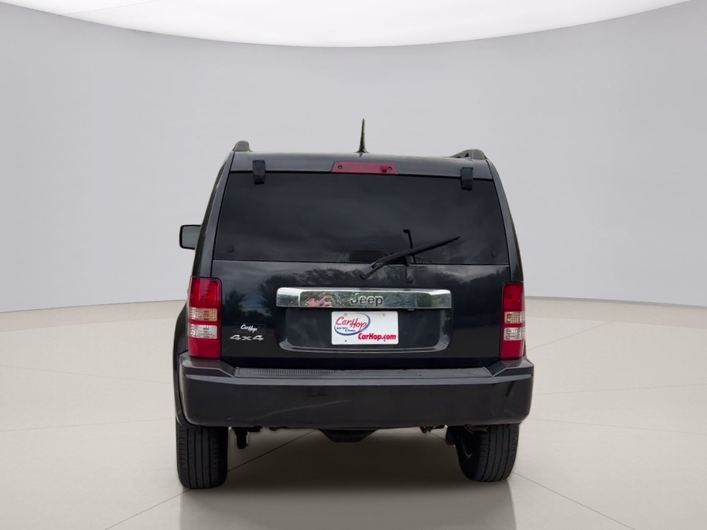 Used 2012 Black Jeep SPORT image 4