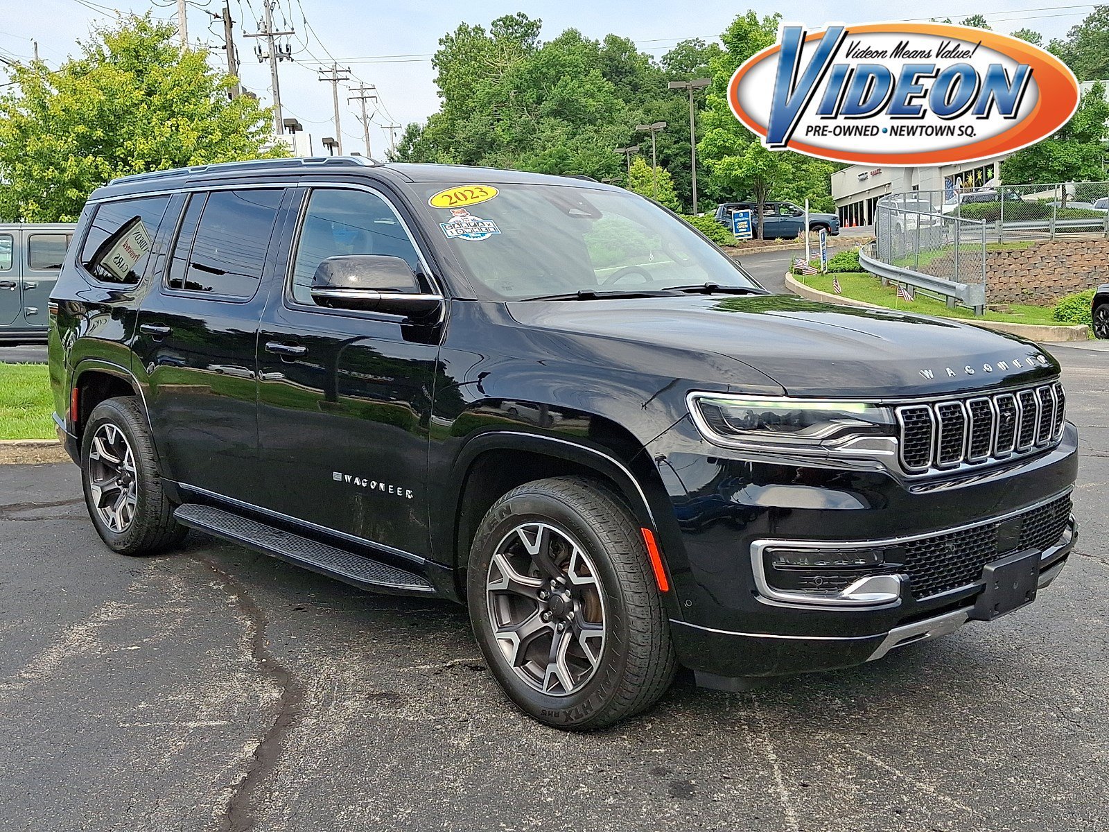 Certified Used 2023 Diamond Black Crystal Pearlcoat Jeep Series III image 1