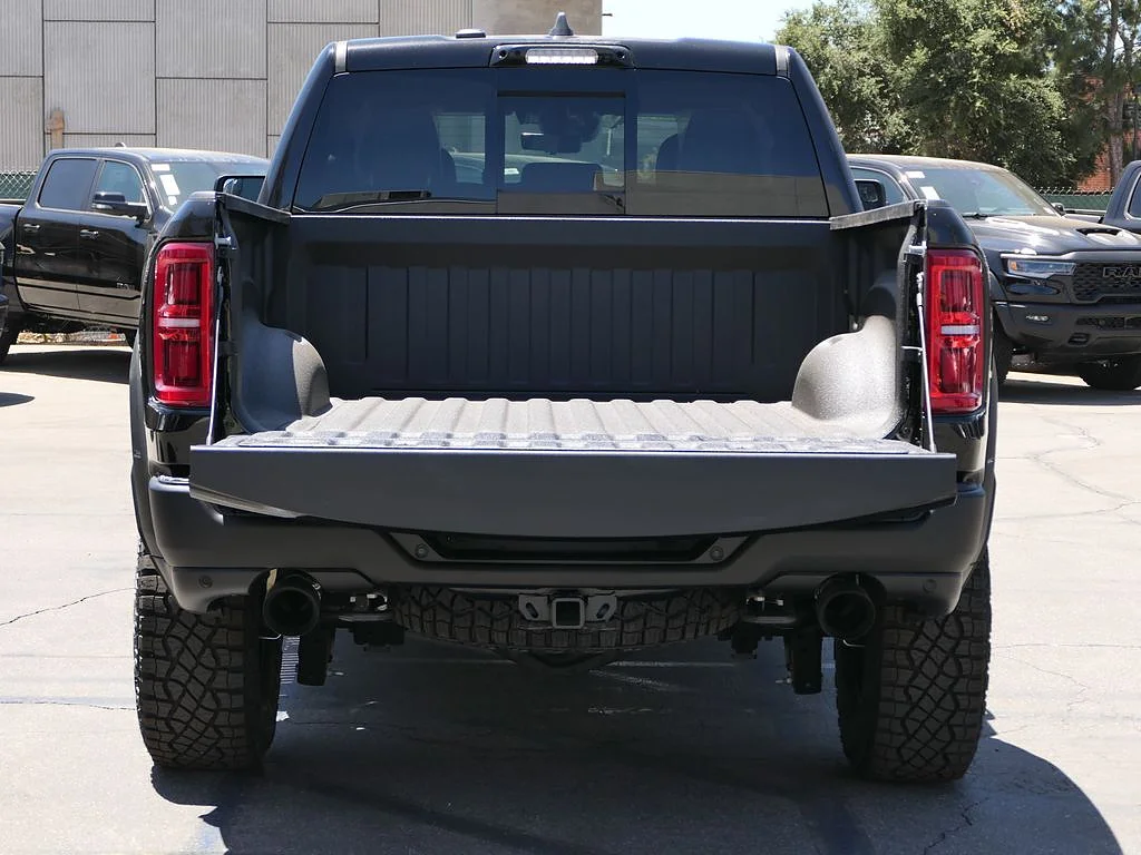 New 2026 Diamond Black Crystal Pearl Coat RAM RHO Crew Cab 4x4 5