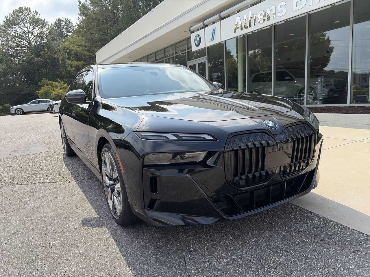 Used 2023 Black Sapphire Metallic BMW 740i image 1
