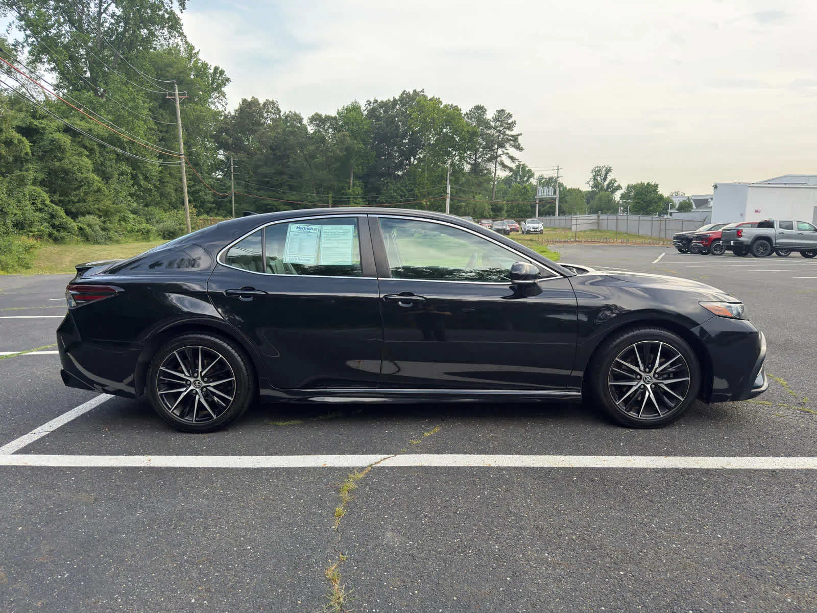 Used 2022 Midnight Black Metallic Toyota SE image 7