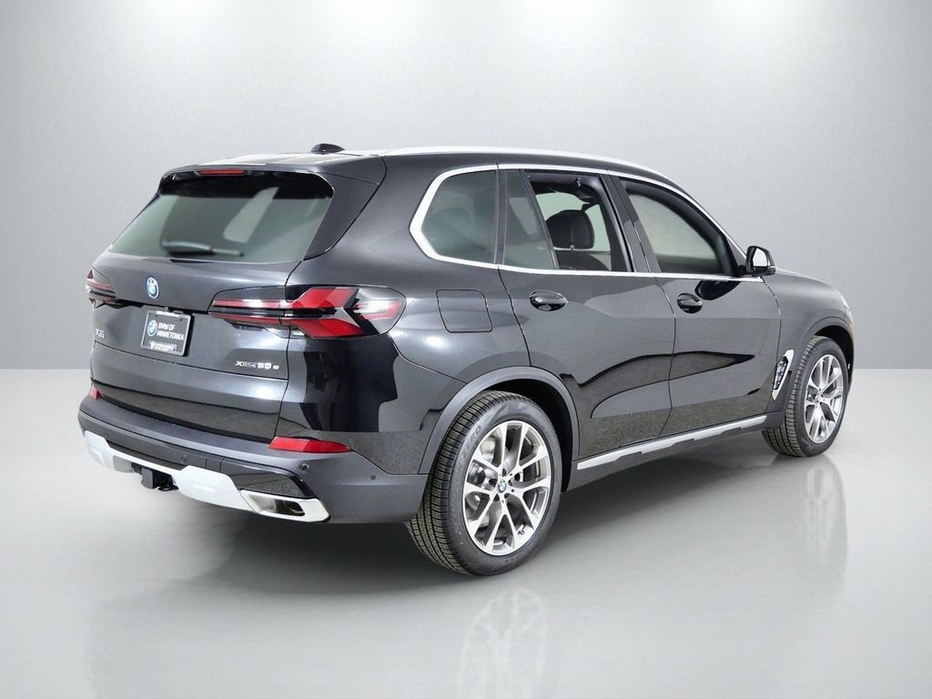 Used 2026 Black Sapphire Metallic BMW xDrive50e image 10