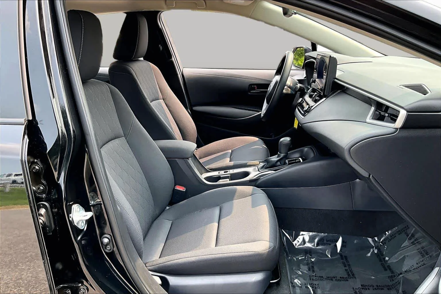 Used 2024 Midnight Black Metallic Toyota LE image 9