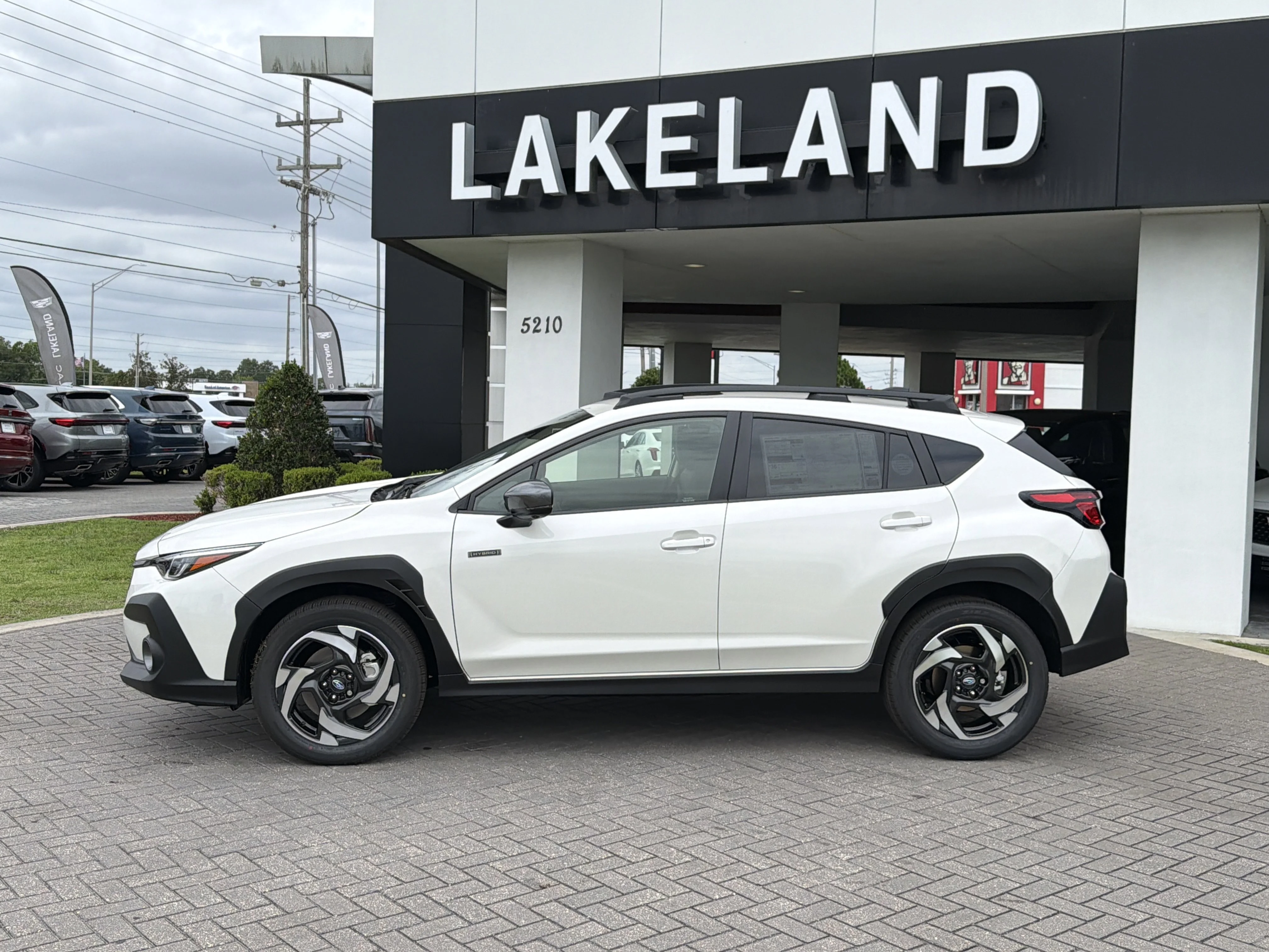 New 2026 CRYSTAL WHITE PEARL Subaru Limited Hybrid image 3