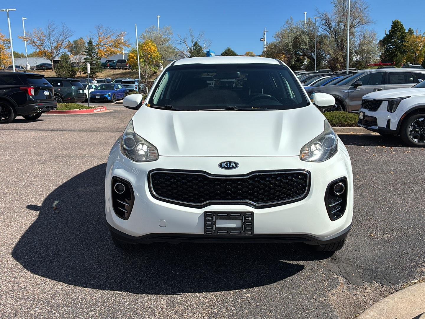 Used 2019 Clear White Kia LX image 2