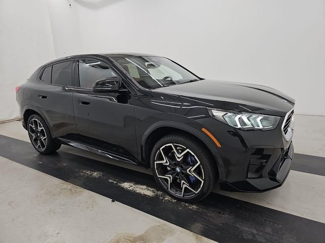 Used 2025 Black Sapphire Metallic BMW M35i image 1