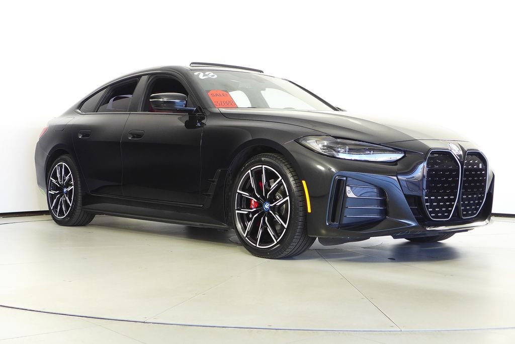 Used 2023 Black Sapphire Metallic BMW eDrive40 image 4