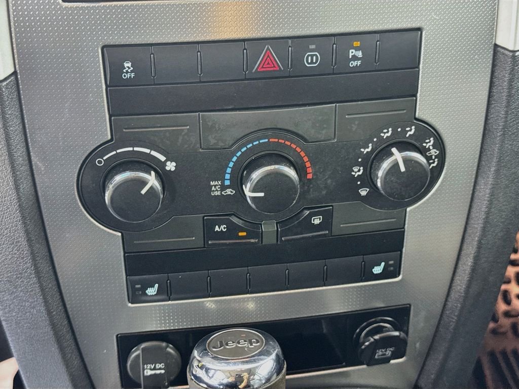 Used 2010 Light Graystone Pearlcoat Jeep Laredo image 17