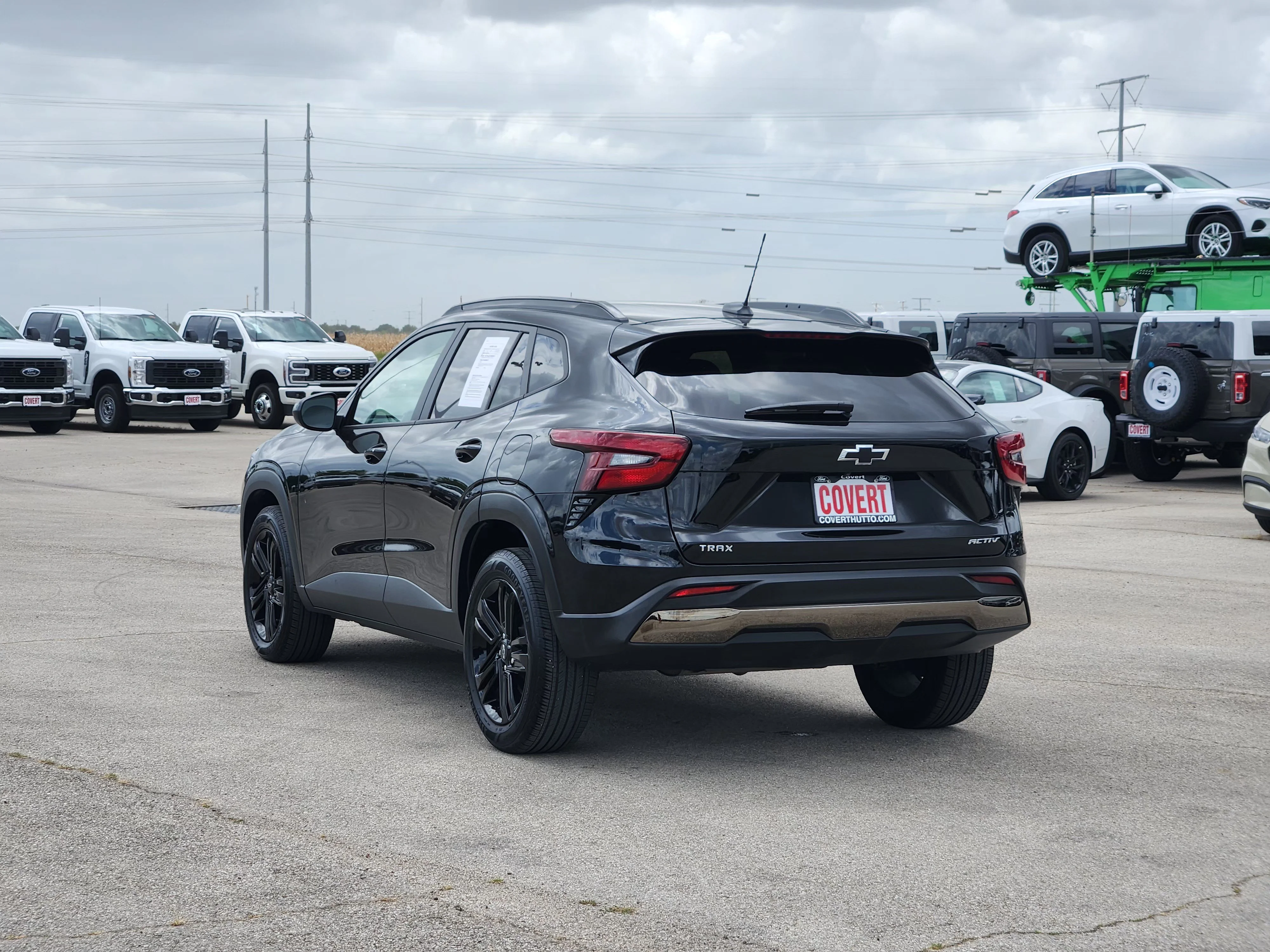 Used 2024 Mosaic Black Metallic Chevrolet ACTIV image 5