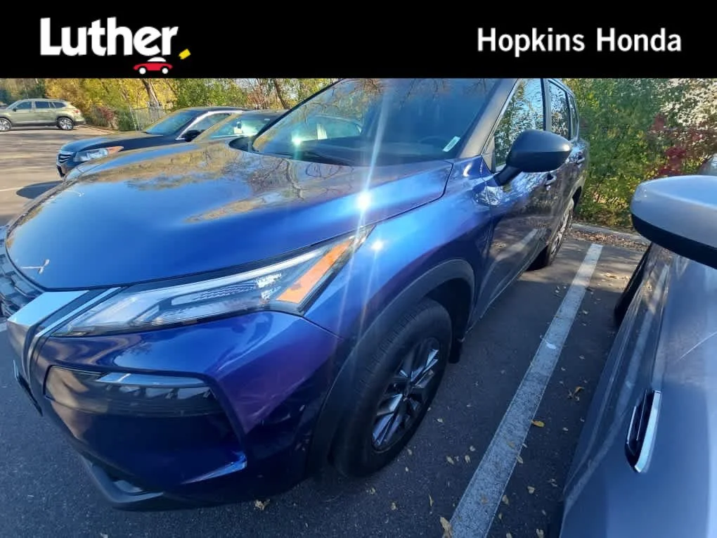 Used 2021 Caspian Blue Metallic Nissan S image 1