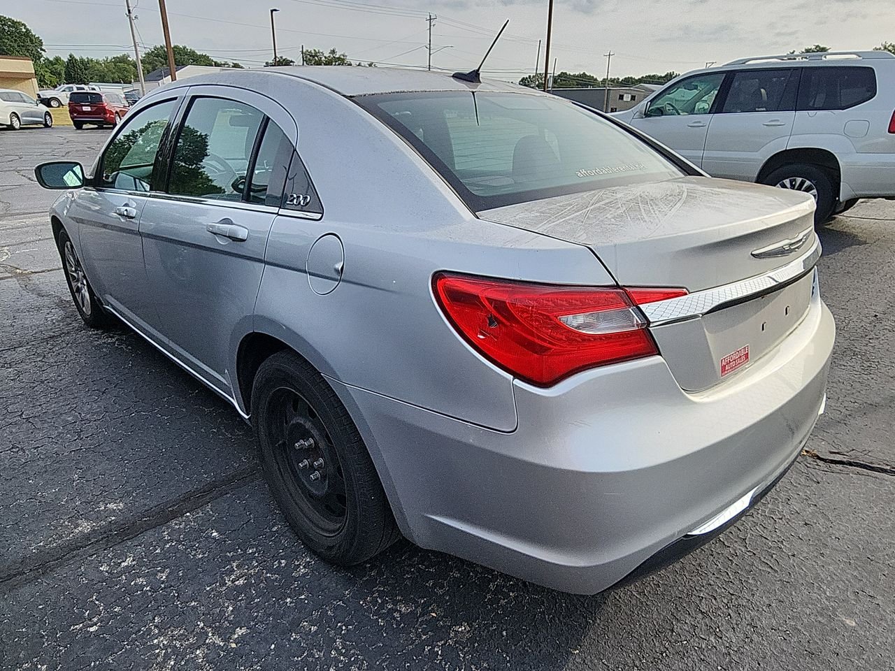 Used 2012 Silver Chrysler LX image 3