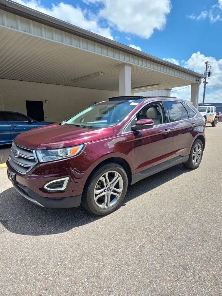 Used 2017 Red Ford Titanium image 1