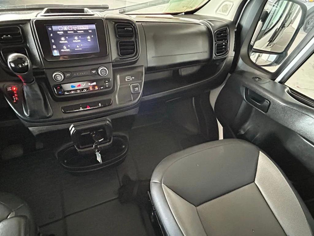 Used 2025 Bright White Clearcoat Ram High Roof image 11