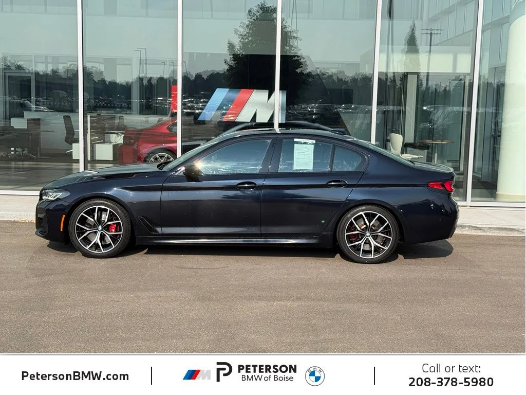 Used 2023 Black BMW M550i xDrive image 2