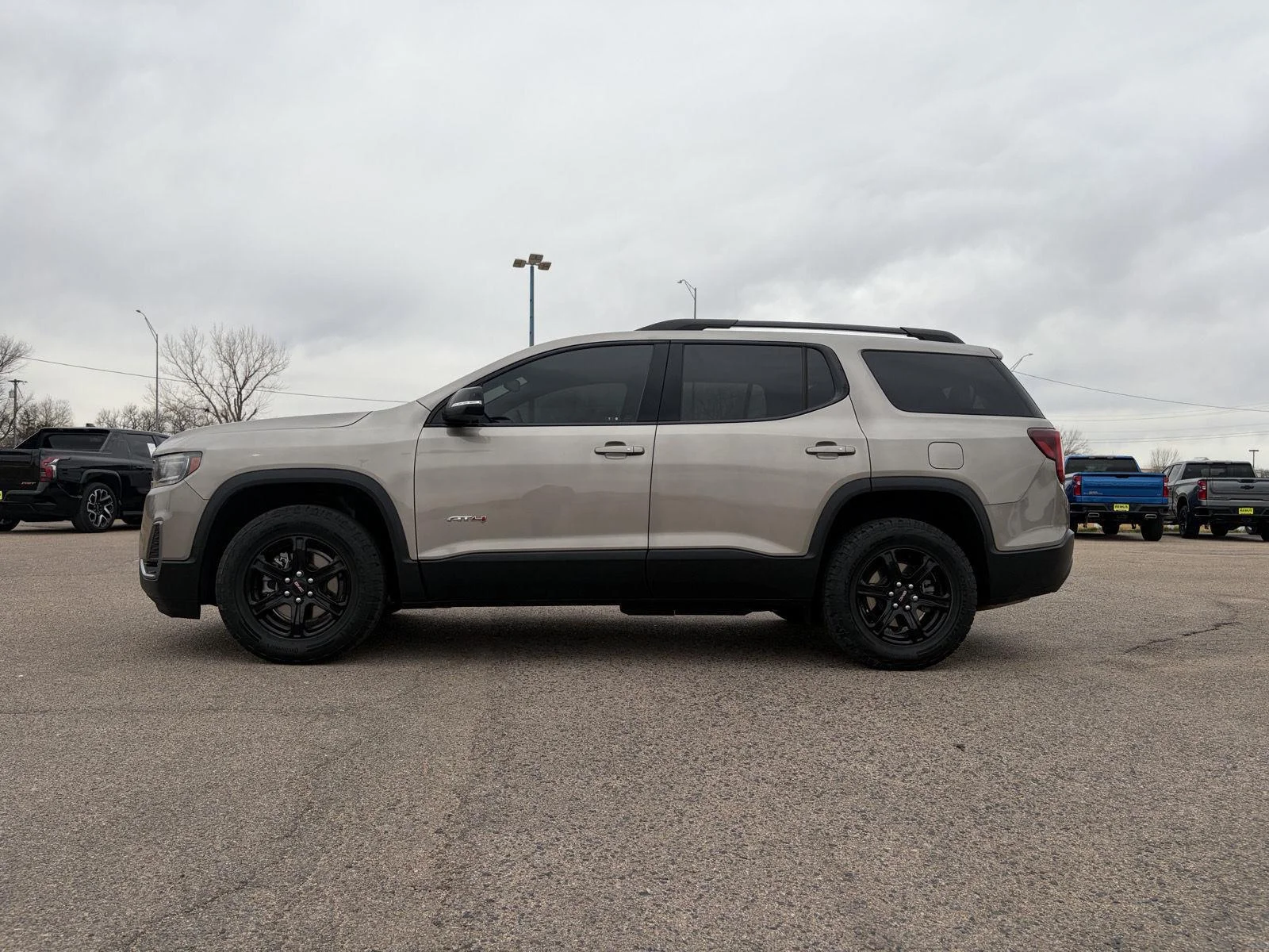Used 2023 Light Stone Metallic GMC AT4 image 4