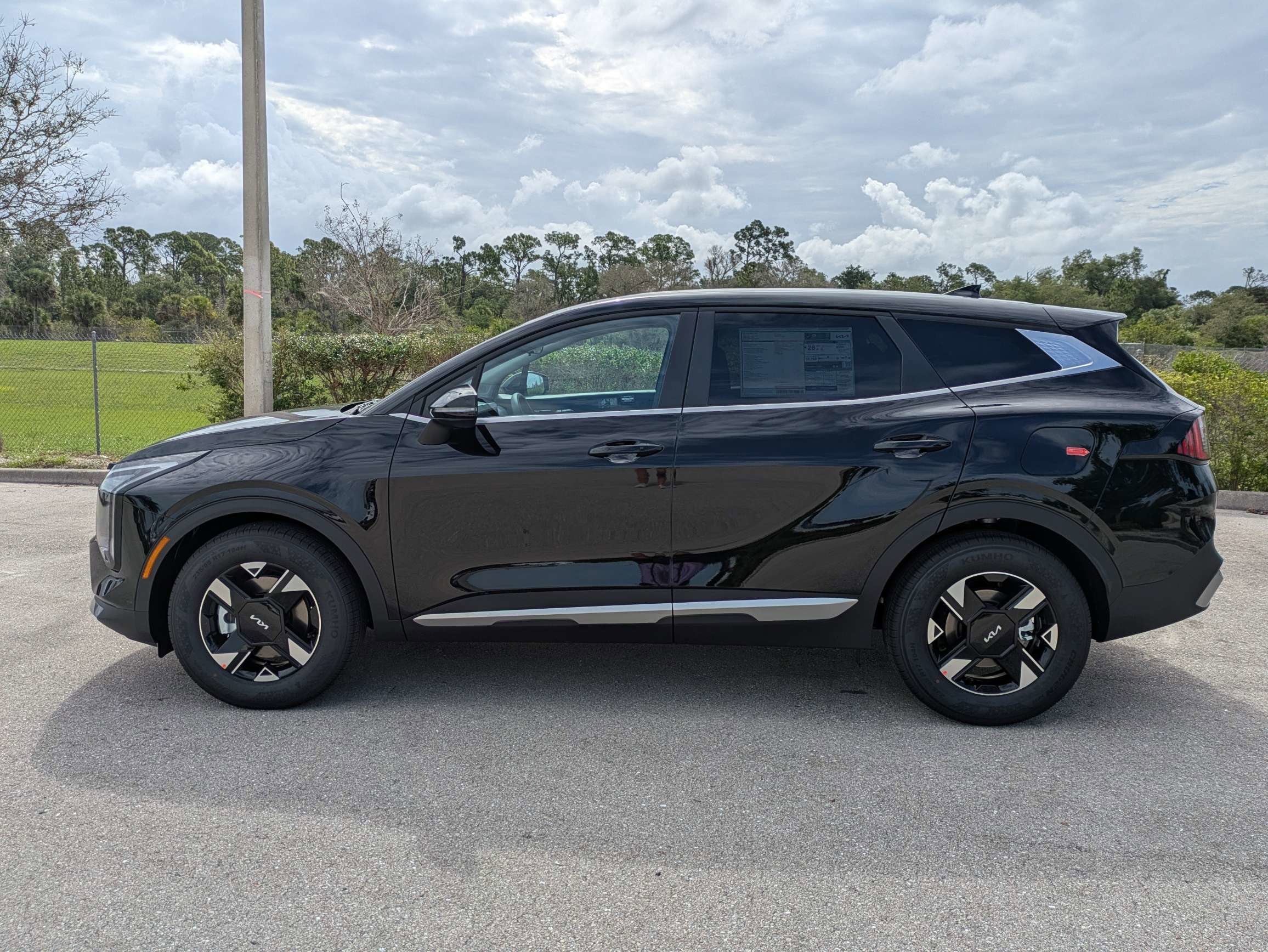 New 2026 Ebony Black Kia LX image 8