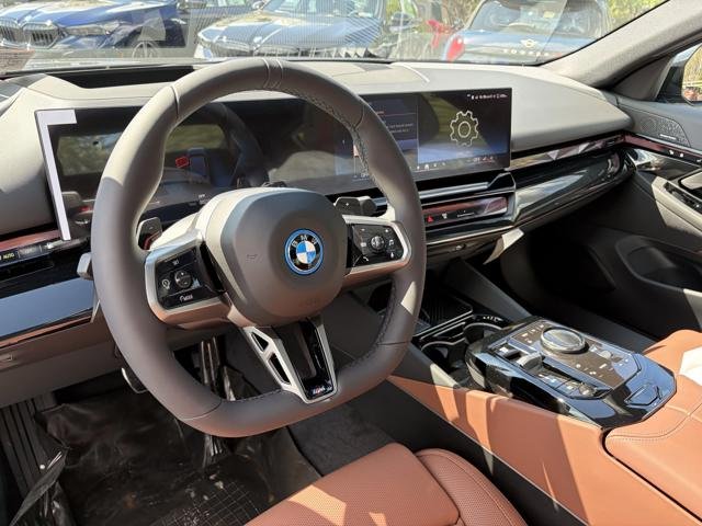 New 2026 Black Sapphire Metallic BMW 550e xDrive image 12