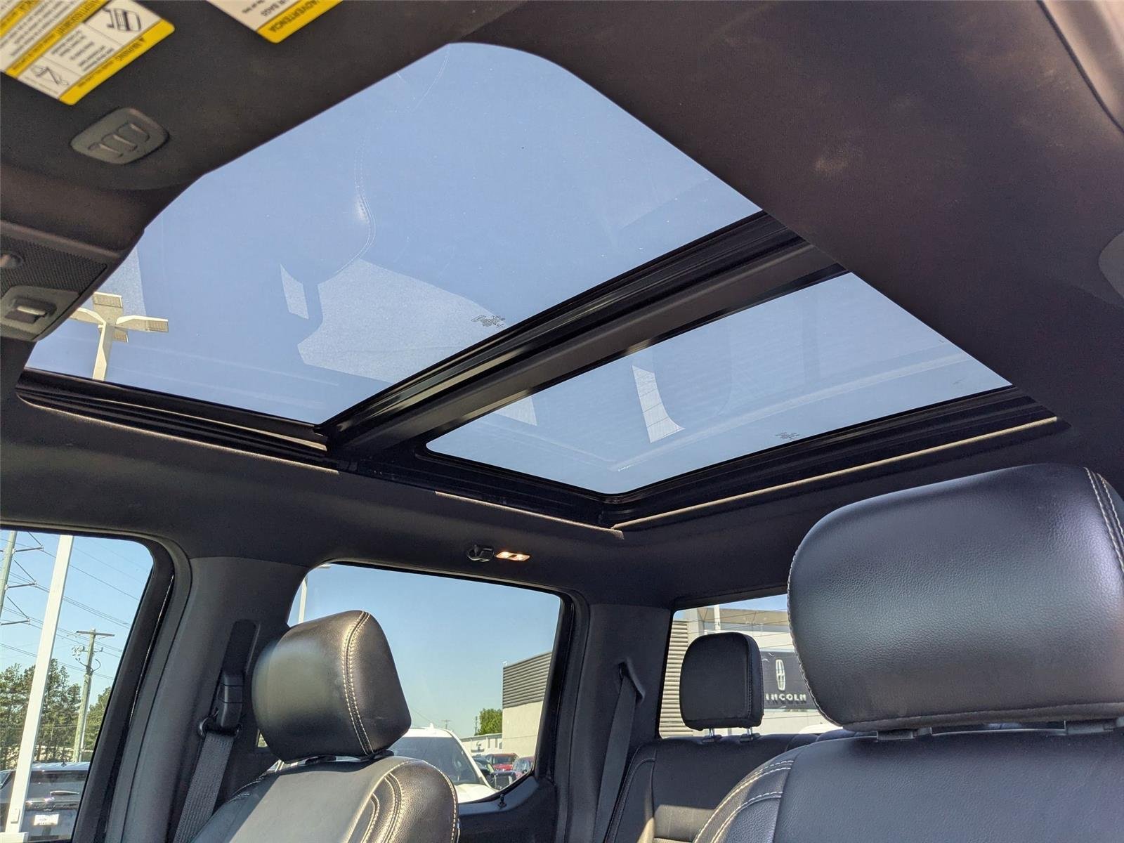 Used 2020 Agate Black Metallic Ford LARIAT image 13