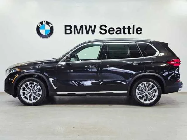 Used 2025 Black Sapphire Metallic BMW xDrive50e image 3