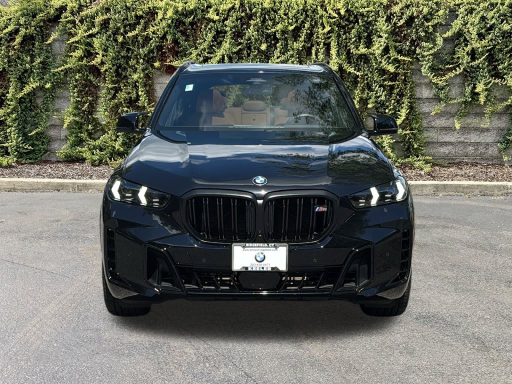 Used 2026 Black Sapphire Metallic BMW M60i image 2