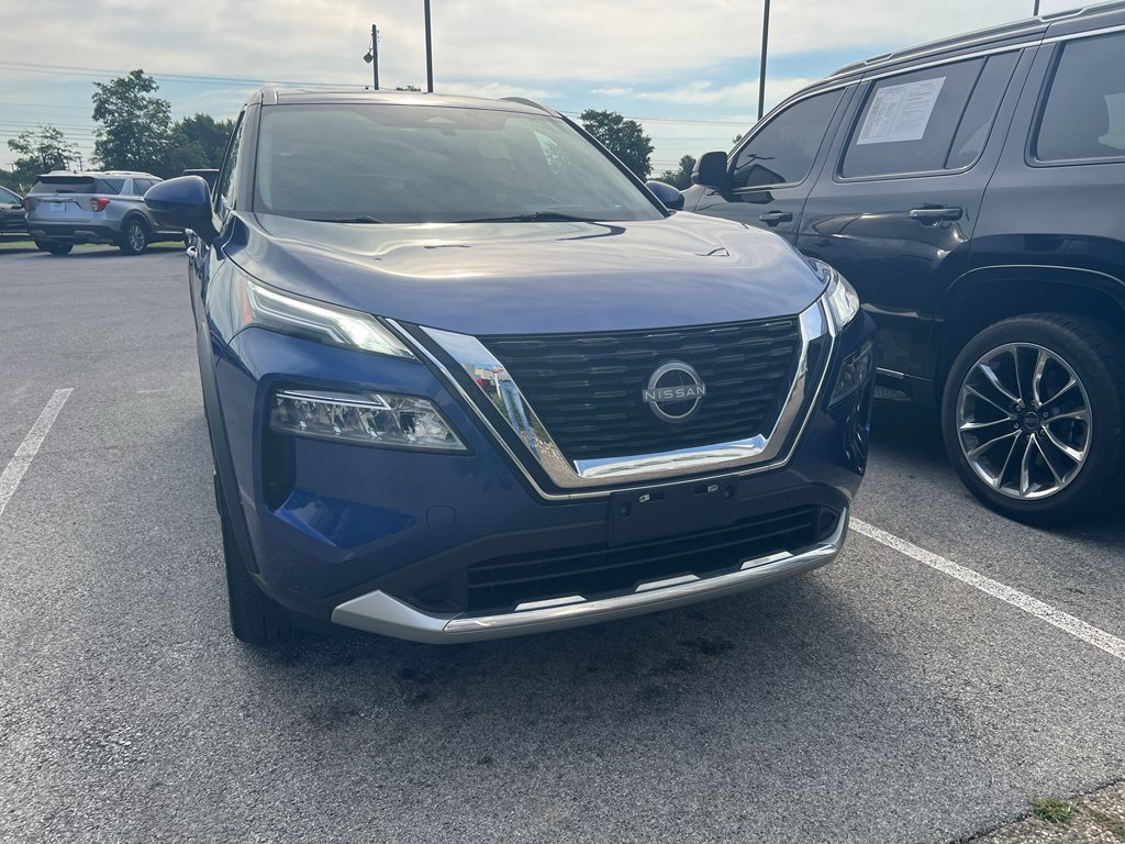 Used 2023 Caspian Blue Metallic Nissan Platinum image 1