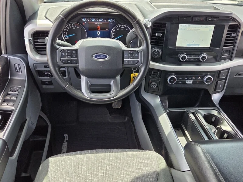 Used 2023 WHITE FORD XLT 4WD SUPERCREW 5.5